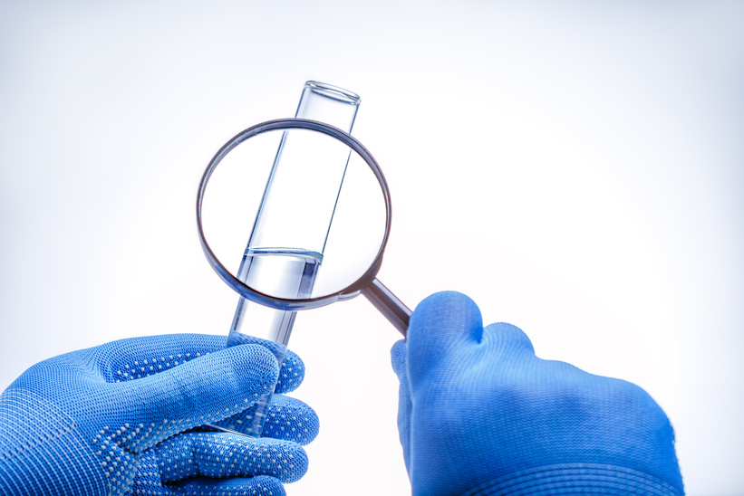 checking water quality at water in laboratory.